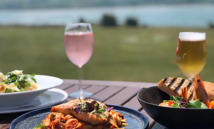 Dining on the terrace at The Cliff Hotel & Spa